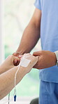 Holding hands, healthcare and nurse with patient in hospital bed for recovery, support or treatment. Comfort, IV drip and medical care with senior person in clinic for assistance, help or wellness