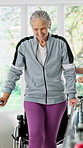 Physiotherapy, old woman and rail at wheelchair for balance, rehabilitation and retirement health. Smile, physiotherapist and senior person with disability at bar, stability and help in consultation