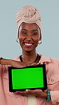 Face, mockup and black woman with tablet green screen for marketing on a studio background. Portrait, happy or female person with smile or technology display for advertising app, UI or UX on space