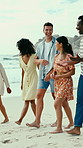Friends, walking and laugh at beach for travel, adventure and gathering for summer holiday. Smile, couple of people and journey at sea for fresh air, getaway trip and tropical vacation for reunion