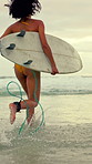 Back, woman and running at beach with surfboard, travel and adventure for summer holiday. Female person, surfer and waves at sea for surfing, getaway journey and water activity for tropical vacation