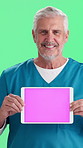 Tablet screen, face and doctor in studio with mockup space for advertising medical service. Happy, mature man and portrait of healthcare worker with technology for marketing by green background.