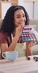 Live streaming, talk and makeup with woman in home for influencer, promotion or brand. Virtual tutorial, content creator and beauty artist review with person and eyeshadow for vlog broadcast