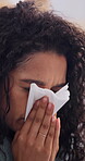 Sick, tissue and sneeze with woman in home for influenza, viral infection and fatigue with disease. Illness, virus and blowing nose with person in living room in apartment for fever and exhausted