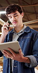 Carpenter, phone call and man with tablet in warehouse, project management and talking with contact. Carpentry, artisan and person with technology, communication and update with mobile in factory