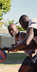 Sport, basketball or black men playing with coach for practice, training or fitness on court. Male people, friends or mentor teaching game with ball or block for match, defense or lesson in park