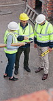 Architect, team and meeting at construction site with tablet, review digital blueprint or discussion. Above, mature people or architecture expert outdoor with tech, online property design or planning