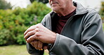 Thinking, hands and old man with cane in garden for fresh air, mindfulness or reflection for health. Retirement, break and elderly person with walking stick for wellness, memory and nostalgia outdoor