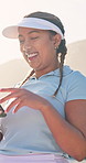 Woman, laugh and break on tennis court with phone, text message notification and funny fitness video. Happy, person outdoor and typing with tech, joke and humor for sports meme on social media app.