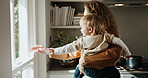 Mother, baby and wave at window in house, greeting and view with communication, woman and child. Parent, toddler and together in home with respect, gesture or hello with connection and motherhood