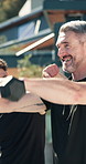 Weights, personal trainer and man outdoor with exercise, muscle training or fitness routine. Equipment, advice and person with coach for active, health or workout with dumbbells in backyard of home.