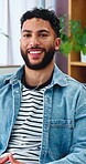 Wellness, face and man in house with smile, positive attitude and unwind with weekend break. Wellbeing, portrait and happy person in home with confidence, good mood and satisfaction on day off.