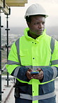 Thinking, architect and man with phone on construction site, texting and communication with contact. Happy, civil engineer and black person with mobile, typing and reading good news on social media
