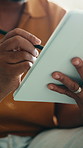 Tablet, pen and hands of man on sofa in house for remote work with web development for online research. Technology, stylus and programmer with software update, system maintenance or app project.