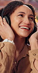 Happy, music and mature woman with headphones for good mood, streaming and relax with favorite song. Home, smile and person with dance, groove and listening to radio, album and track on weekend