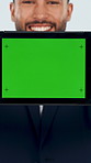 Face, business man and tablet in studio with green screen, advertising and website for real estate. Portrait, realtor and tech with mockup space, presentation and property auction on white background