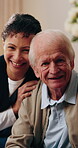 Assisted living, face and nurse hugging senior man in retirement home for elderly care o r support. Healthcare, insurance and smile with happy caregiver embracing patient in apartment for wellness