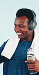 Fitness, dance and phone with black man and headphones for streaming, workout playlist and water bottle. Happy, audio subscription and training music with person on white background studio for energy