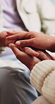 Holding hands, empathy and caregiver with senior person, help and sympathy for patient or healthcare. Assisted living, elderly care and comfort with gesture, healing and nurse with support and trust