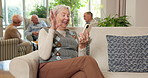 Phone, old woman or wave on video call in care home for hello, retirement update or online connection. Happy, senior person and virtual chat in assisted living with greeting, catch up or conversation