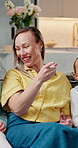 Laughing, watching tv and relax with family on sofa in home for streaming service, cartoon channel and bonding. Funny show, connection and kids movie with parents and children in living room of house