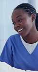 Nurse, talking and advice with black woman in hospital for patient checkup, medical update and smile. Healthcare feedback, consulting and recovery ward with person in clinic for treatment and help