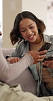 Happy, phone and friends on sofa for visit, conversation and social media on weekend together. Relax, home and people on cellphone for online message, talking or gossip for bonding, chill and hangout