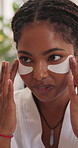 Talking, beauty and woman with eye mask in home for dark circles, pamper and bonding on weekend. Friends, happy and people with pads for wellness, health and benefits for self care in morning