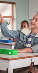 Student, teacher and high five in classroom for success, learning or education with celebration. Boy, learner and winning with tutor for academic achievement, test results or passed exam in school