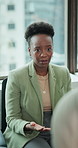 Therapy, talking and business woman in workshop for mental health, wellbeing and counseling. Office, conversation and people in support group for help, session or workplace wellness for stress relief