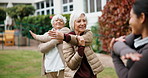 Stretching, instructor and senior women outdoor for wellness, exercise and warm up for mobility. Retirement, garden and woman with elderly people for fitness session, balance and movement for health