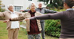 Instructor, exercise and senior people outdoor for wellness, movement and warm up for mobility. Retirement, garden and woman with elderly group for fitness session, balance and active for health
