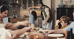 Father, child and dancing at family dinner in house with love, energy and happiness or bonding. Man, daughter or people together in dining room for food, fun and spin with learning, gathering or meal