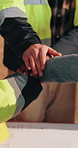 Construction, team and handstack at site for collaboration, planning and cooperation with applause. Engineer, people and huddle at worksite for project management, compliance agreement and motivation