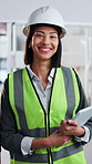 Face, woman and engineer at construction site, tablet and laugh for development with safety helmet. Portrait, happy person and civil engineering professional with tech in building, pride and about us
