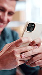 Hands, phone and man in small business for distribution, ecommerce or supply chain service. Entrepreneur, supplier or typing in workshop for export, startup growth or stock inventory for logistics