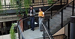 Business, people and document on staircase with tablet, discussion and manuscript for article draft. Team, walk or digital on steps with paperwork, copywriting report and conversation for publication
