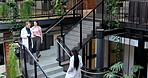Healthcare, team and doctors with tablet, stairs and treatment plan with patient history and report. Hospital, steps and mature people with technology, happy and walking with test results on website