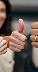Feedback, hands and thumbs up with business people in office for approval, support or thank you. Gesture, review and vote with employee team in corporate workplace for achievement, like emoji or yes