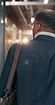 Back, thinking and walking with businessman in financial office for start of corporate job. Arrival, finance and ideas with accounting employee at investment firm for wealth management career