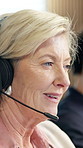 Woman, headset and talking in call center for advice, customer support and finance help. Coworking, mature agent and mic in agency for client communication, virtual meeting and online feedback