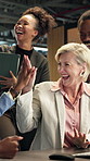 Happy, winning and high five with business people in office for achievement or success together. Excited, employees or colleagues with smile or fist pump for team accomplishment or work celebration