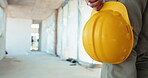 Construction, builder and hand with helmet in building, walking or safety compliance for inspection. Architecture, quality control and person with hardhat for protection, ppe and property development
