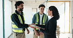 Architect, team and meeting on construction site with handshake for welcome or partnership. People, greeting and shaking hands with tablet for introduction, agreement and deal for architecture