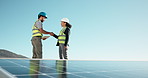 Handshake, solar panels and technician team outdoor for maintenance, repairs or renewable energy. People, space and engineers shaking hands for sustainable deal on photovoltaic cells for installation
