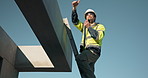 Ladder, thumbs up and construction engineer with radio on roof, inspection feedback or space below. Communication,  talk or man outdoor for building check approval, structure integrity or site safety