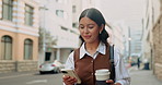 Business, woman and coffee in city with phone, travel research and contact buyer for real estate. Smile, female realtor or commute in town with mobile, price property and beverage for auction inquiry