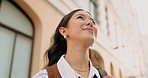 Happy, business and woman outdoor with vision, evaluation and daydreaming for real estate. Below, female realtor or breathe in city for fresh air, reflection and property resale for urban development