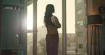 Thinking, planning and business woman by window for choice, strategy and idea for property investment. Office, flare and person with reflection, inspiration and solution for commercial real estate