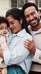 Smile, face and love with family outdoor for bonding, connection and real estate investment. Happy, hug and moving with parents and baby on front lawn of house for care, trust and security together